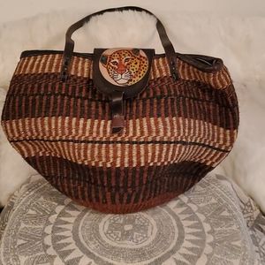 Handcrafted leather trim purse
